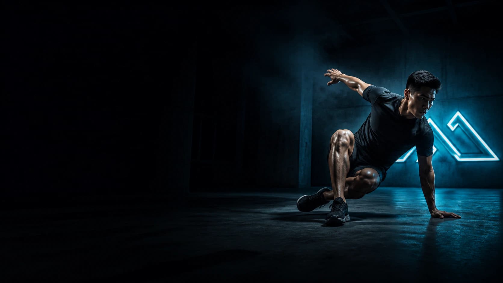 Project Peak athlete moving with focused strength in a dark training studio